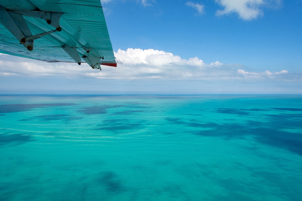 Sunken boat with coral in Bahamas sea
