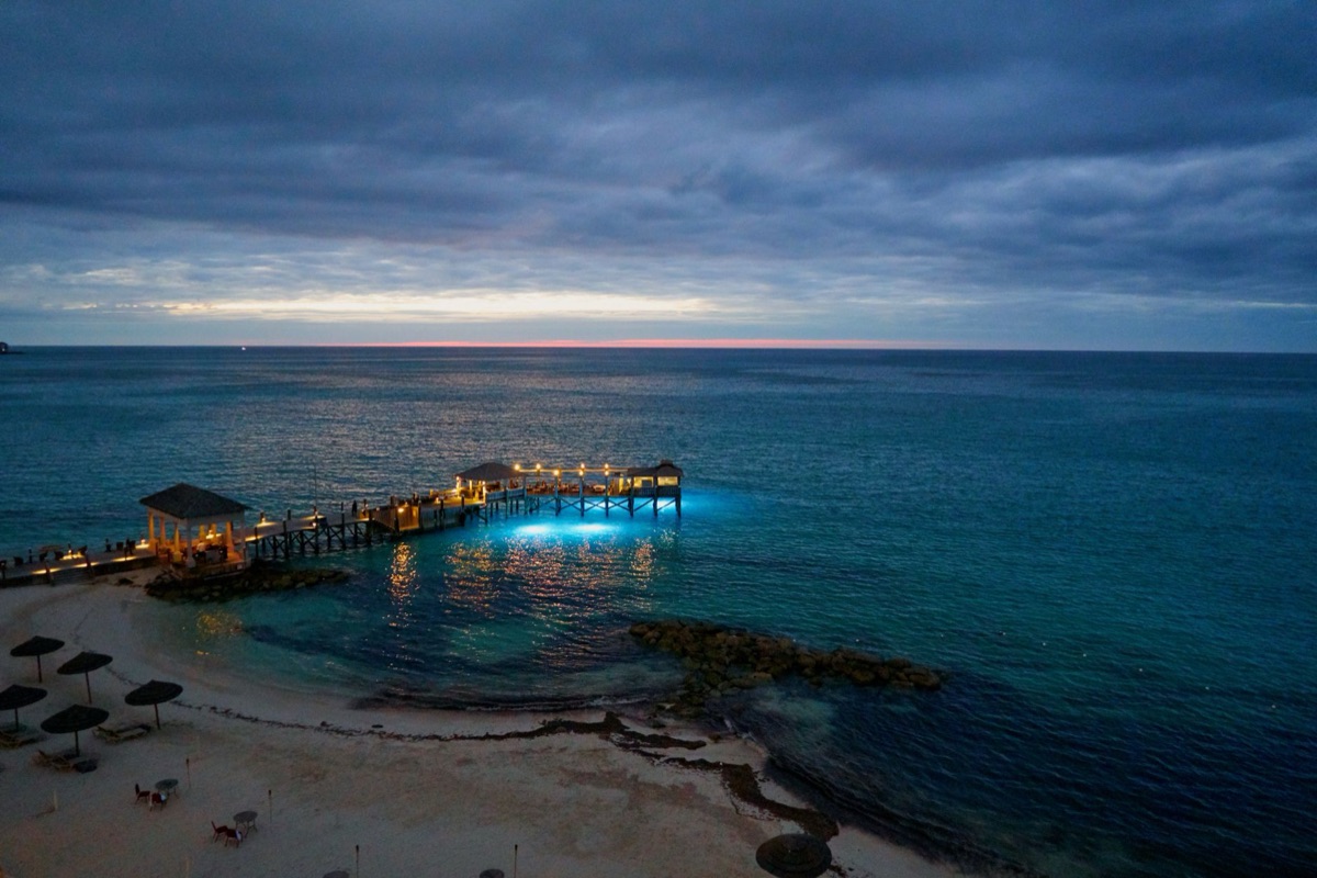 Sunrise over a Bahamas island with turquoise water and white sand
