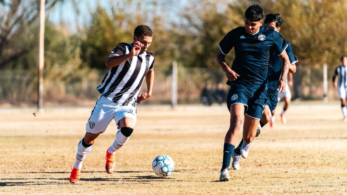 soccer players in team uniforms