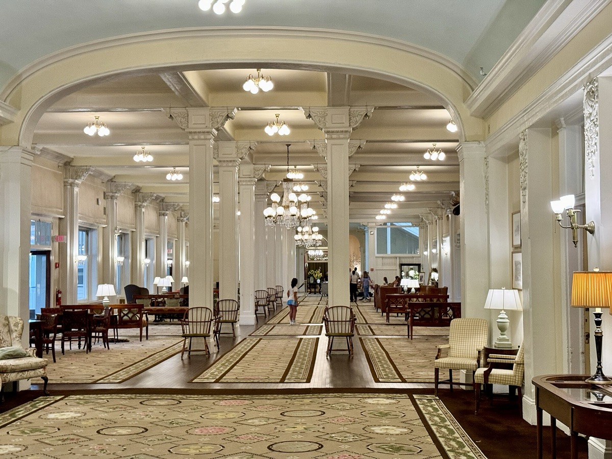 luxury resort hotel lobby with tropical palm tree