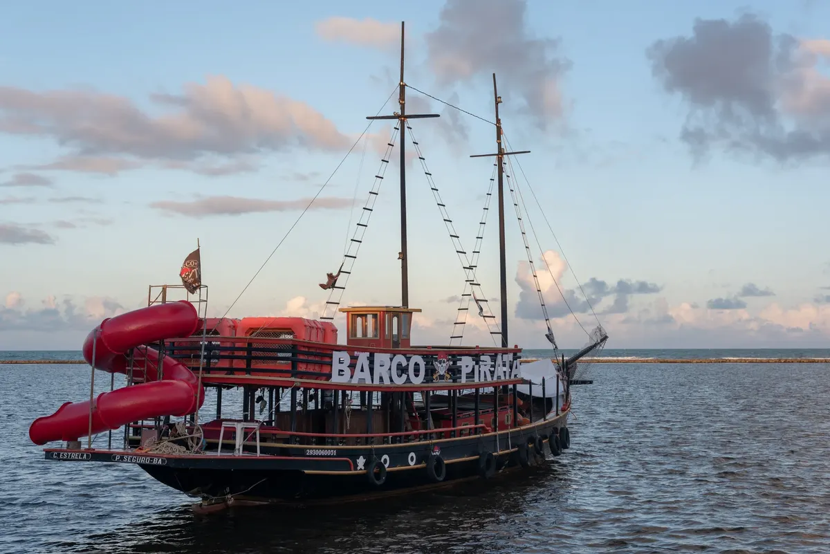 Scenic view of a pirate-themed ship during sunset in Arraial d'Ajuda, Brazil.